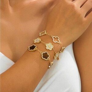 Elegant Gold and Black Floral Bracelet